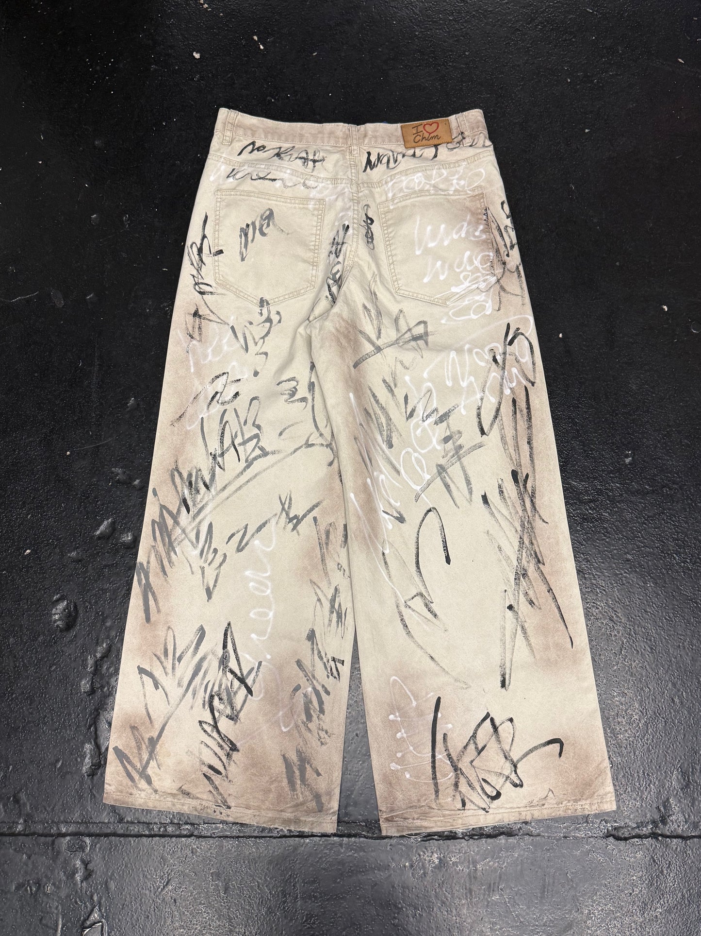 HAPPY MEMORIES DON’T DIE HMDD GRAFFITI CHINO PANTS (PRE-OWNED)