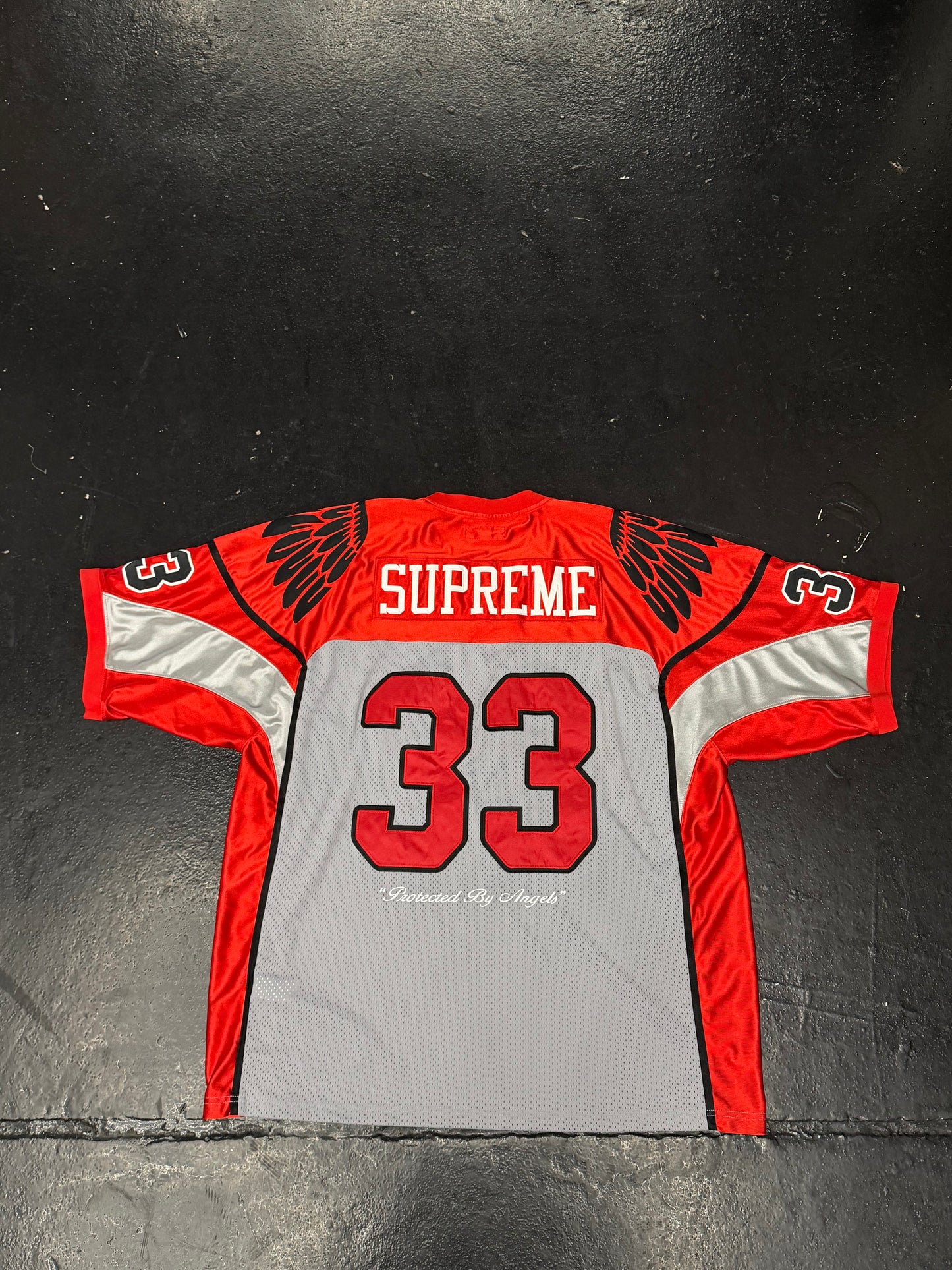 SUPREME WINGS FOOTBALL JERSEY (PRE-OWNED)