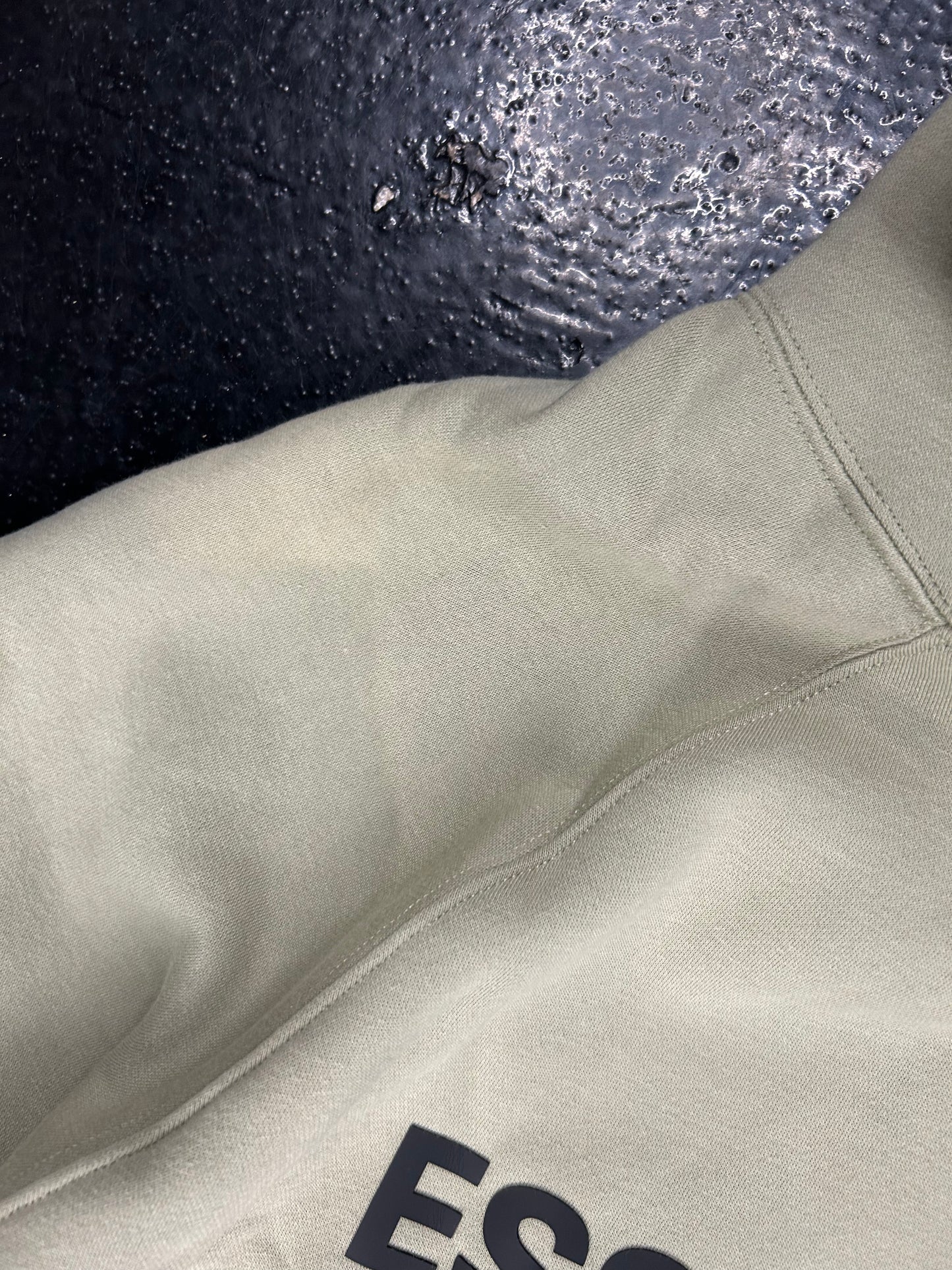 ESSENTIALS GREEN HOODIE FADED (PRE OWNED)