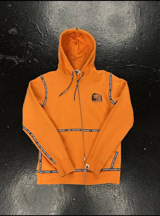 BATHING APE CAUTION TAPE ZIP UP (PRE OWNED)