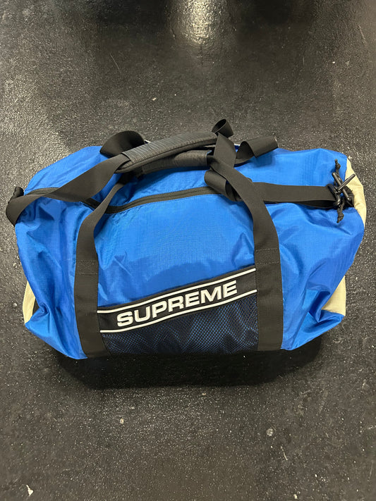 SUPREME BLUE DUFFLE BAG (PRE-OWNED)
