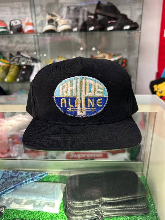 RHUDE ALPINE BLACK SNAPBACK HAT (PRE OWNED)