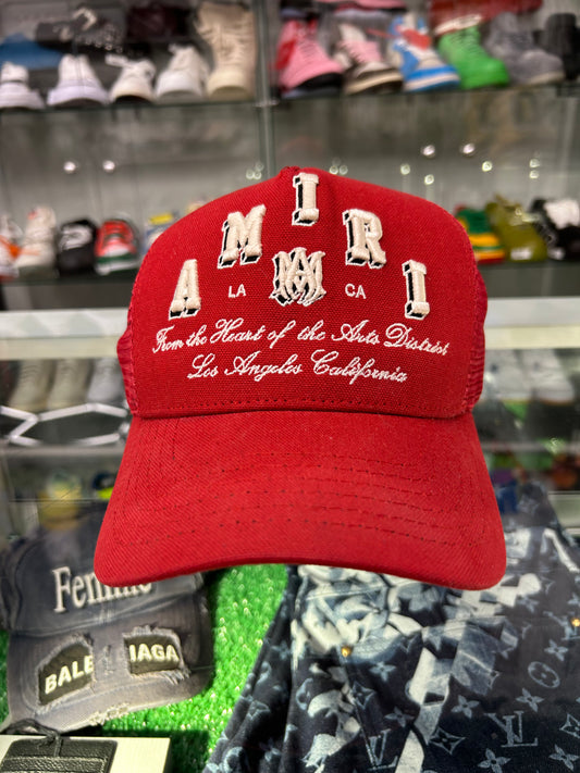 AMIRI RED SPELLOUT TRUCKET HAT (PREOWNED)
