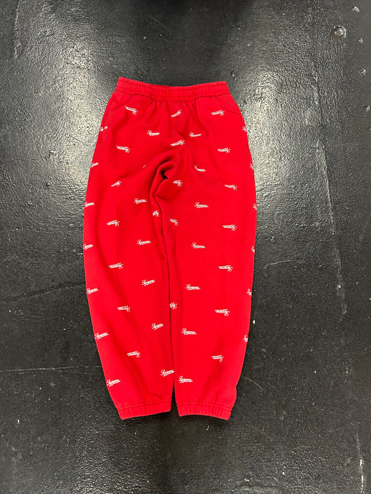 SUPREME REPEAT SCRIPT RED CUFFED SWEATPANTS (PRE-OWNED)